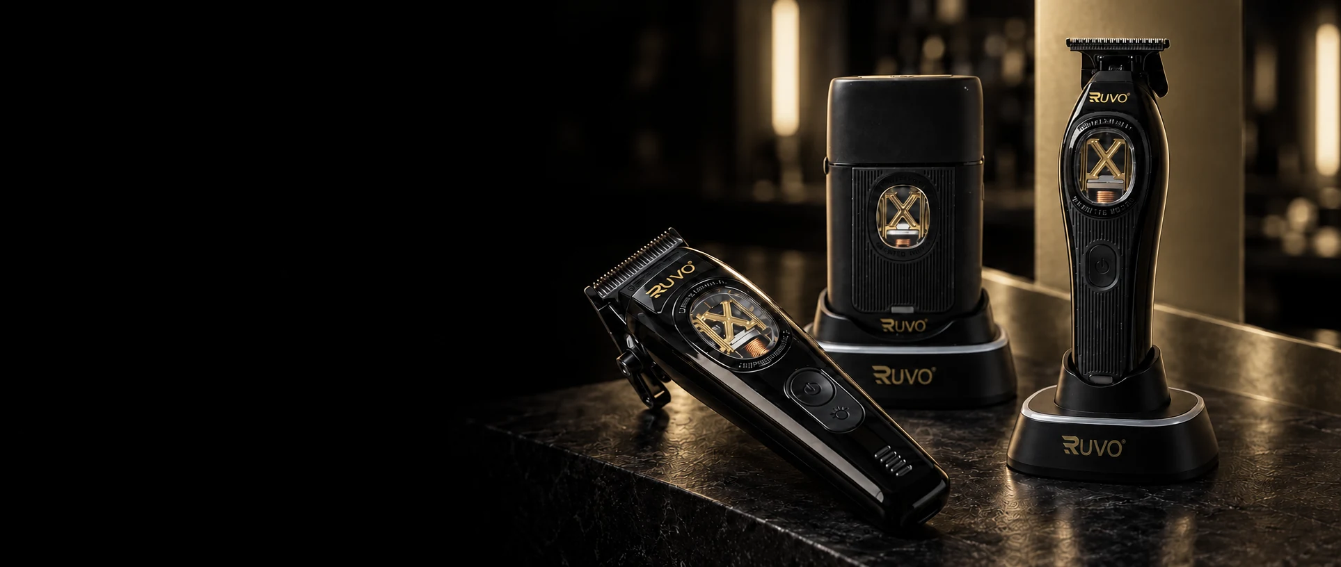 RUVO professional clipper, trimmer and foil shaver on a black marble barber station